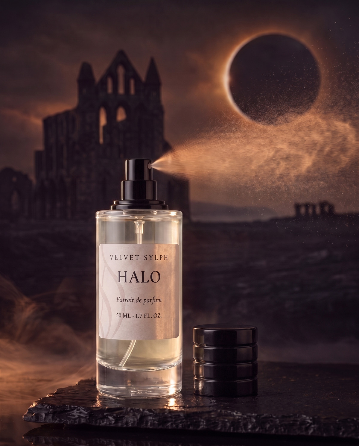 Halo extrait de parfum mid-spray, the black cap resting beside the bottle